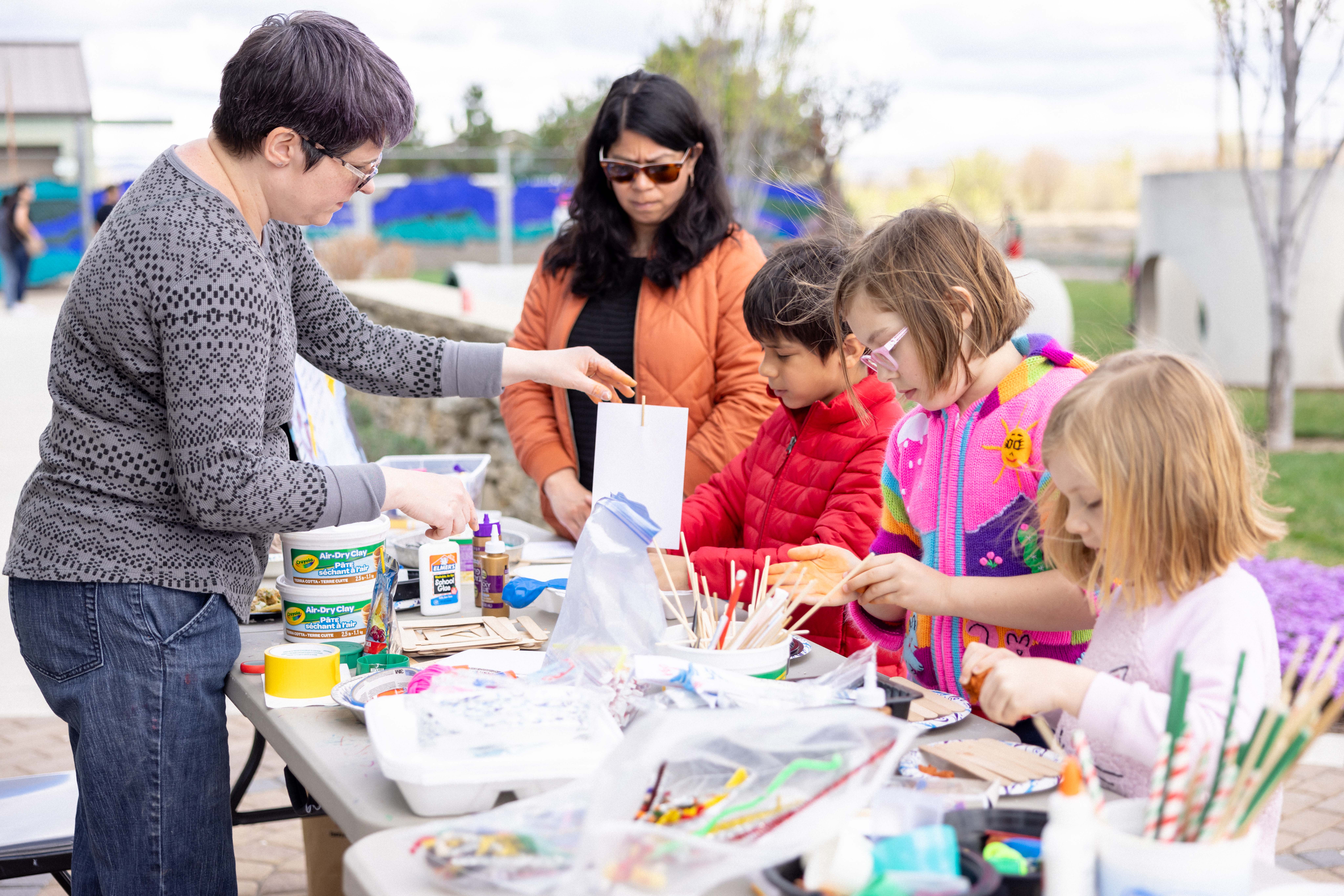 Students work on a craft at an outdoor education station at The Boise WaterShed.